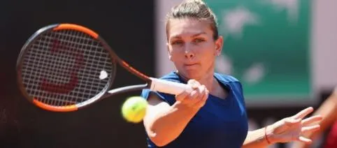 Halep poate pierde bani mulţi dacă ratează Roland Garros