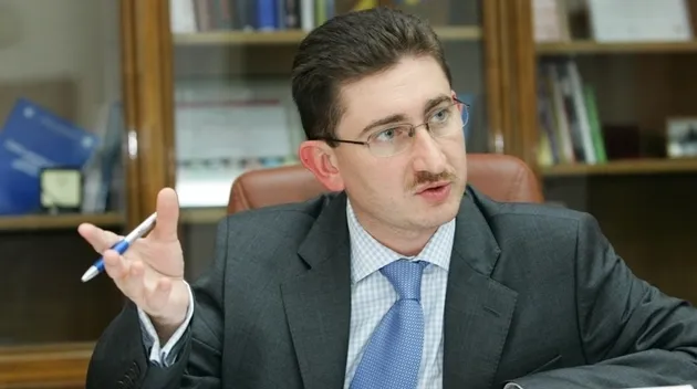 Şeful Consiliului Concurenţei, Bogdan Chiriţoiu, spune că a fost ameninţat de o multinaţională în birou