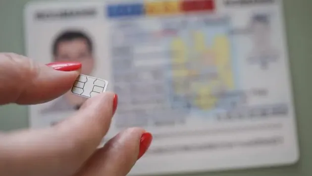 Buletinul cu cip a fost votat în Parlament