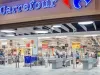 Auchan vrea să cumpere Carrefour  