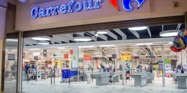 Auchan vrea să cumpere Carrefour  