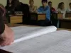 O singură medie la final de an, pentru elevi, fără teze. Profesorul şi elevul scapă de „norma” de note