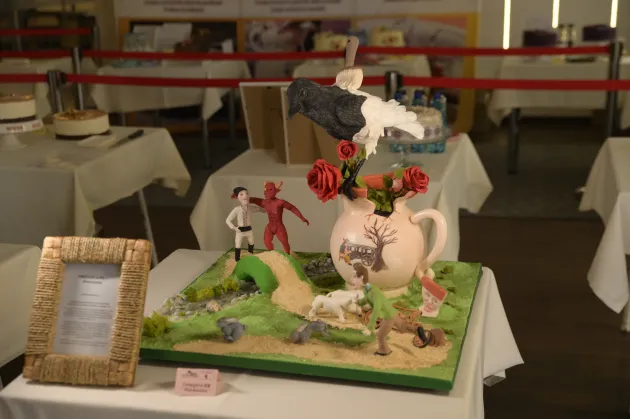 Piesa artistică 2024:  proverbele ascunse în prăjitură