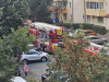 Explozie în bloc, urmată de incendiu  