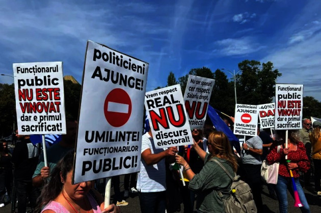 Sindicatele au acceptat să amâne protestele după discuţiile cu Bolojan 