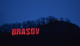 Primăria Braşov şi inscripţia de pe Tâmpa, roşii pentru 112