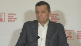 Bolojan, acuzat la Braşov de „cinism” în problema preţului carburanţilor 