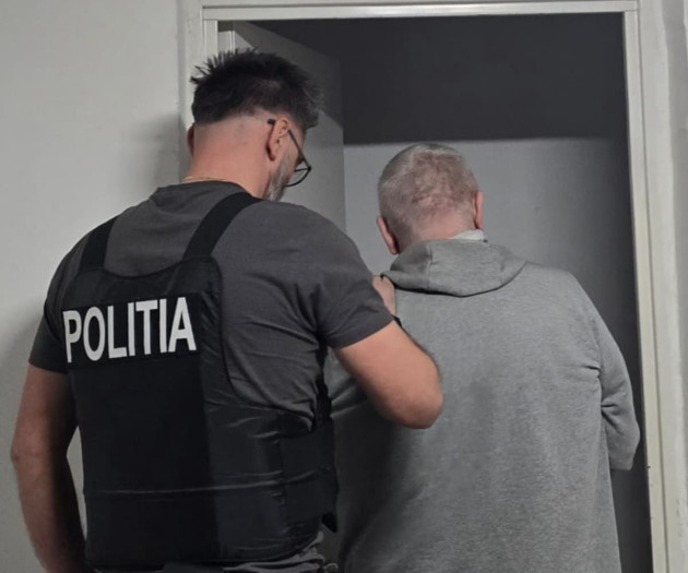 Adus sub escortă din Lituania